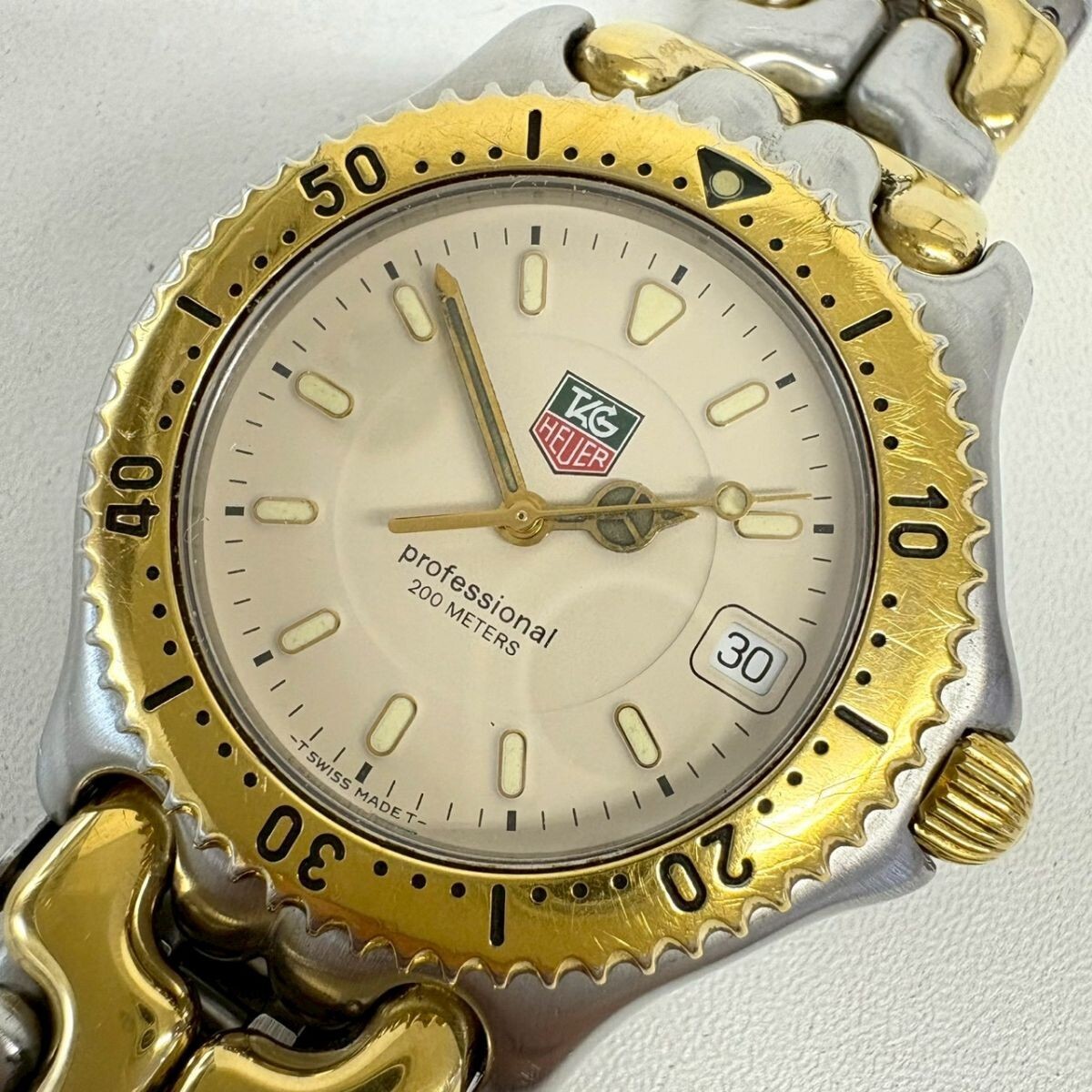 R236-O64-1234 【電池交換済み/稼働】 TAG HEUER タグホイヤー メンズ腕時計 セル WG1121-0 QUARTZ 回転 ...